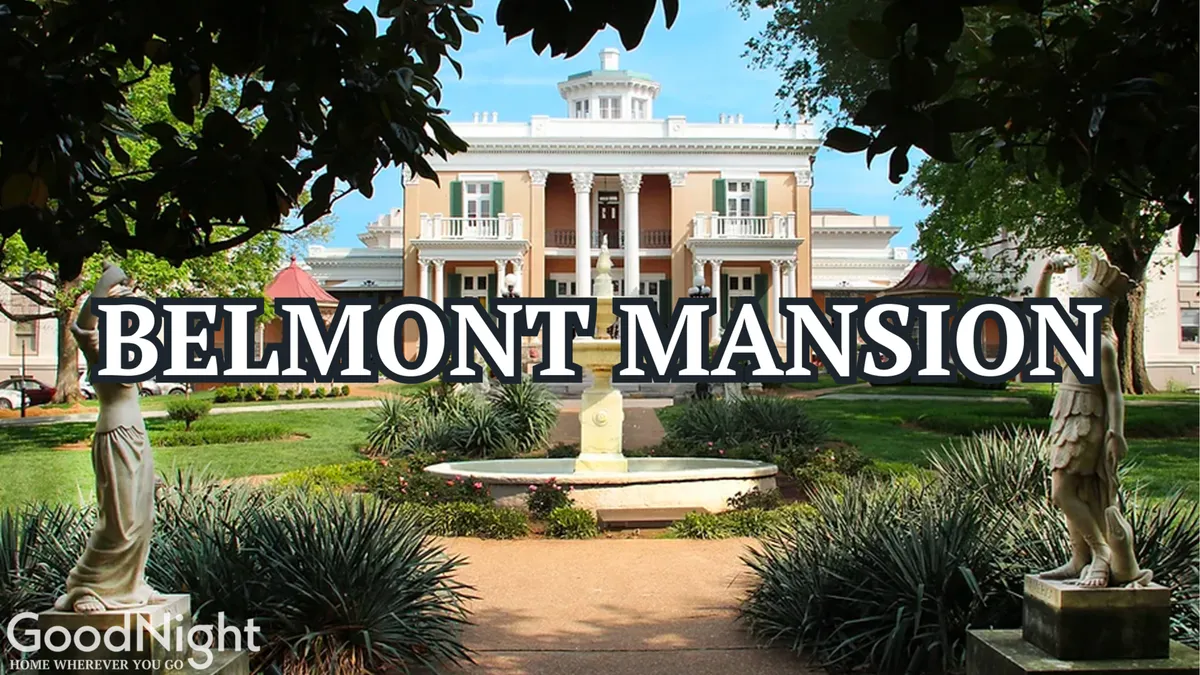 A grand exterior shot of Belmont Mansion framed by a fountain, statues, and lush gardens. The elegant architecture and inviting landscaping highlight a significant local historic site.